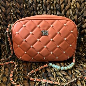 NWT!!! Badgley Mischka: Pearl/ Coral
Quilted Purse. Vegan Leather.